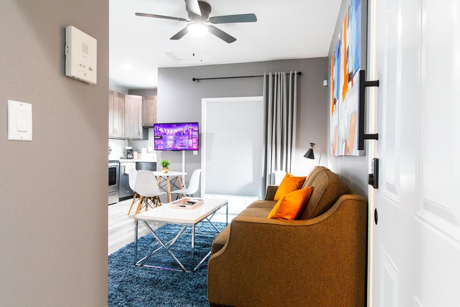 Large-studio-balcony-desk-ac-full-kitchen *